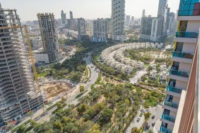 an aerial view of a city with tall buildings at Executive 1BR at Hadley Heights, JVC Dubai with balcony City Views in Dubai