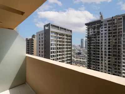 a view from the balcony of a building at Exquisite Lavish Studio in Ghalia JVC -16 in Dubai
