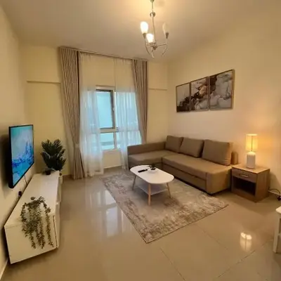 Cozy 1BR Family Apartment with Balcony in JVC - JLiving