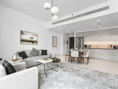 a living room with a couch and a table at Breathtaking 1 BDR with Palm & Marina View-25 in Dubai
