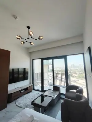 a living room with a couch and chairs and a large window at 4 Months Offer Brand new Modern Prime Amenities in Dubai