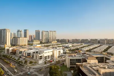 an aerial view of a city with tall buildings at FIRST CLASS 1BR Urban Serenity Near Downtown in Dubai