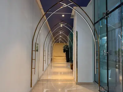 a hallway with an archway in a building at Studio with Pool & Canal Views - Near Dubai Mall - Downtown in Dubai