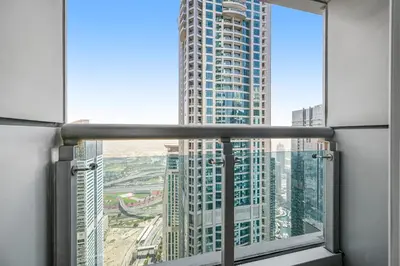 a view of a tall building from a window at Ample space 2BR Princess towers Marina in Dubai