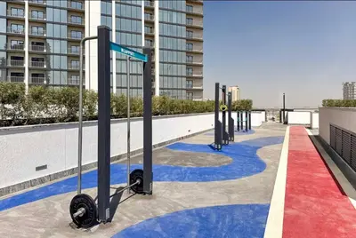 a row of poles on the roof of a building at Brand New 1 Bedroom Apartment in Sobha Hartland Dubai in Dubai