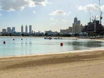 a large body of water with a city in the background at LUX Seaview Studio - Beach Access in Dubai