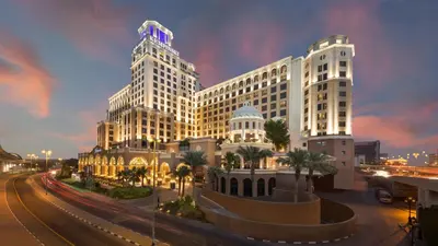 a rendering of a large building in a city at Aspen Chalets by Kempinski Hotel Mall of The Emirates in Dubai
