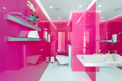 a pink bathroom with a sink and a toilet at JBR Luxury Penthouse with private pool, cinema, gym, spa etc in Dubai
