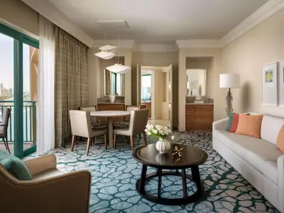 a living room with a couch and a table at Atlantis, The Palm in Dubai