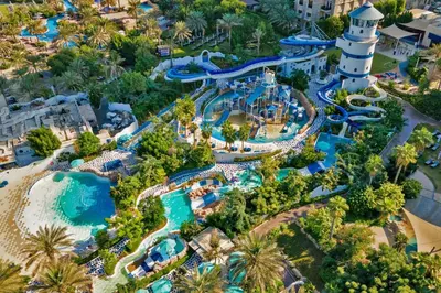 an aerial view of a water park at a resort at Le Meridien Mina Seyahi Beach Resort & Waterpark in Dubai
