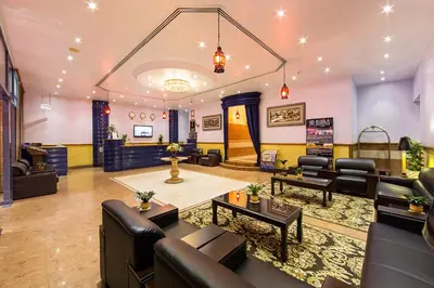 a waiting room with couches and a salon at Rolla Residence Hotel Apartment in Dubai