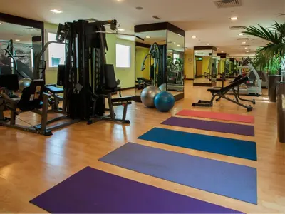a gym with many different colored mats on the floor at Citymax Hotel Bur Dubai in Dubai