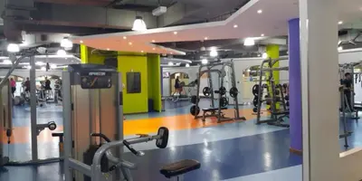 a gym with several treadmills and machines at Murjan Suites Waterfront Jumeirah Beach Residence The Walk & Dubai Eye & Beach & Marina in Dubai