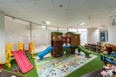 a room with a play area with a playground at EDEN'S Homes & Villas - KG Tower in Dubai