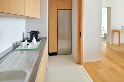 a kitchen with a sink and a counter top at Vida Creek Harbour in Dubai