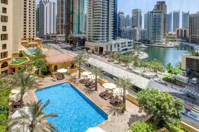 an overhead view of a swimming pool in a city at SUHA JBR Hotel Apartments in Dubai