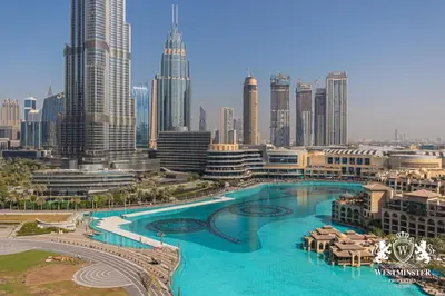 a view of a city with a large swimming pool at Westminster Burj Residences in Dubai
