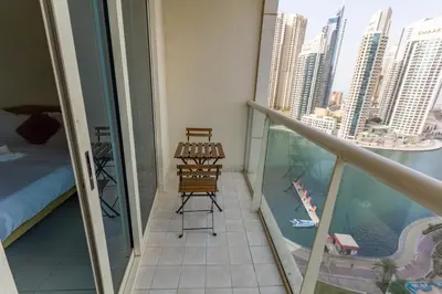 a balcony with a view of the city at Deluxe Studio for Rent at Marina View Towers in Dubai