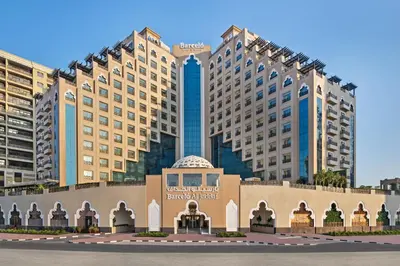 a large building with a sign in front of it at Barcelo Al Jaddaf, Dubai in Dubai