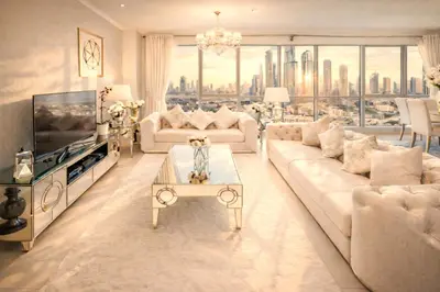a living room with white furniture and a large window at Elite Royal Apartment - Full Burj Khalifa and Fountain View - The Royal in Dubai
