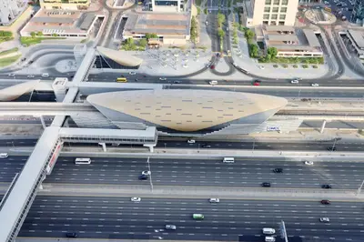 an overhead view of a city with a building at Elite Duplex Penthouse Steps from Metro & Marina in Dubai