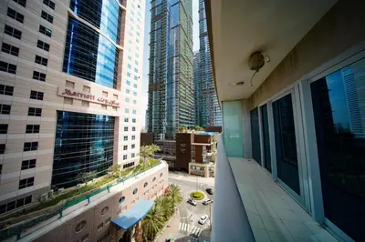 a view from the balcony of a building with tall buildings at Luton Vacation Homes -sea view -Damac Heights, Dubai Marina -90AB2 in Dubai