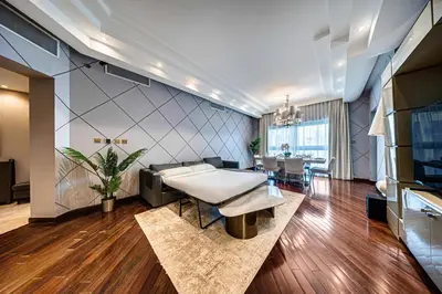 a living room with a couch and a table at Nice 2BD apartment in the Palm Jumeirah in Dubai
