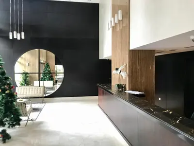 a kitchen with a christmas tree in a room at Al Majara by EMAAR, Dubai Marina in Dubai