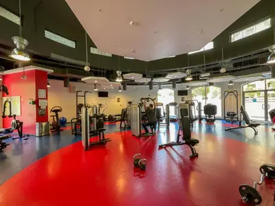 a gym with treadmills and ellipticals in a room at HiGuests - Amazing Sea Views from this 2BR Apt in JBR in Dubai
