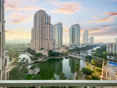 a view of a river in a city with tall buildings at GuestReady Holiday Homes - Sunny Delights in Dubai
