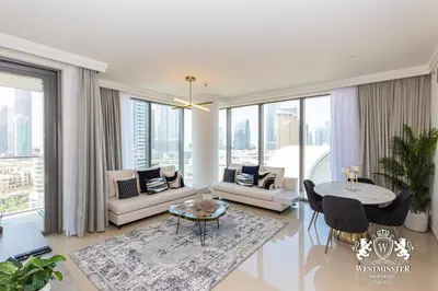 a living room with a view of a city at Westminster Boulevard Point in Dubai
