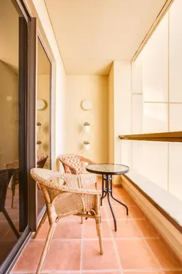 a room with two chairs and a table and a window at 1 Bedroom with Stunning Ain Dubai and Full Sea View in Dubai
