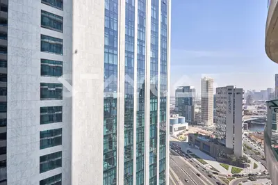 a view of a tall building in a city at Staycae Holiday Homes - Upper Crest in Dubai