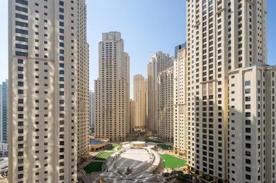a view of a large city with tall buildings at Frank Porter - Trident Grand in Dubai