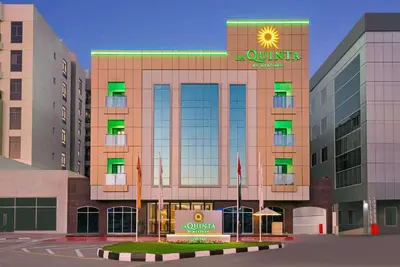 a rendering of the outside of a hotel at La Quinta by Wyndham Dubai Jumeirah in Dubai
