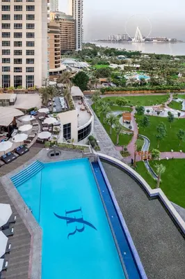 an overhead view of a swimming pool at a hotel at Al Habtoor Grand Resort, Autograph Collection in Dubai