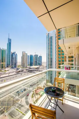a balcony with a view of a city at Stylish Studio in West Avenue Dubai Marina in Dubai