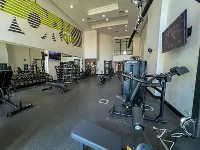 a gym with a lot of treadmills and machines at Durrani Homes - Heaven On Earth- Burj Khalifa Fireworks in Dubai