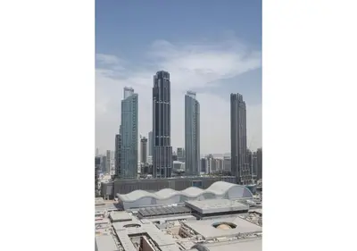 a view of a city skyline with tall buildings at Dubai Mall Residences -Luxury 1 bedroom in Dubai