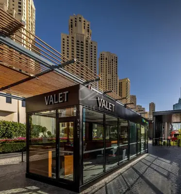 a view of a vitt store in a city at Stunning 2BD sea view apartment in Jbr in Dubai