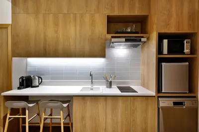 a kitchen with a sink and a microwave at Element Al Mina, Dubai Jumeirah in Dubai