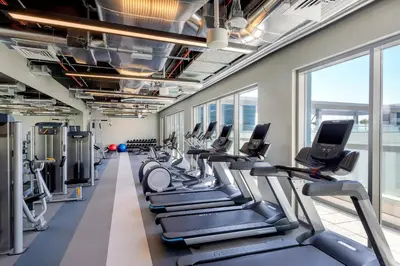 a gym with treadmills and elliptical machines at Element Al Mina, Dubai Jumeirah in Dubai