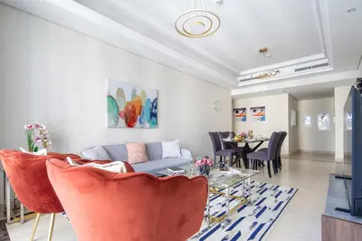 a living room with a couch and a table at Frank Porter - Mon Reve in Dubai
