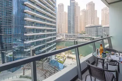 a balcony with a view of a city at Frank Porter - Silverene in Dubai