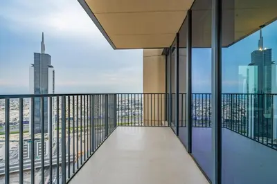 a balcony in a building with a view of the city at Breathtaking City Views From DT Apt with Terrace in Dubai