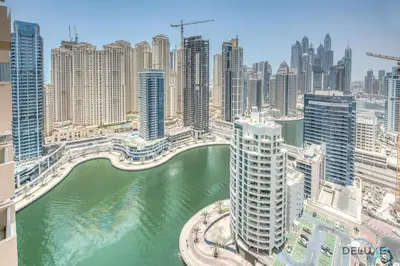 an aerial view of a city with a river and buildings at Exquisite 1BR at The Address Residences Dubai Marina by Deluxe Holiday Homes in Dubai