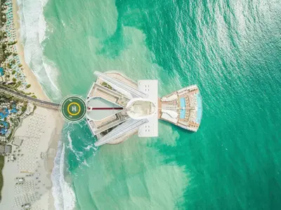 an aerial view of a cruise ship on the beach at Jumeirah Burj Al Arab Dubai in Dubai