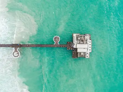 an aerial view of a building in the ocean at Jumeirah Al Qasr Dubai in Dubai