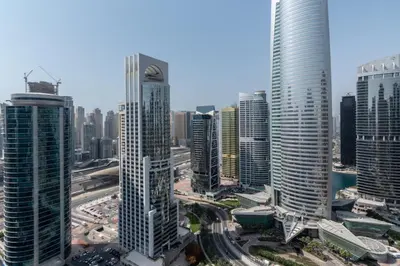 a group of tall buildings in a city at GuestReady - Gray Cloud Retreat - MBL Cluster in Dubai