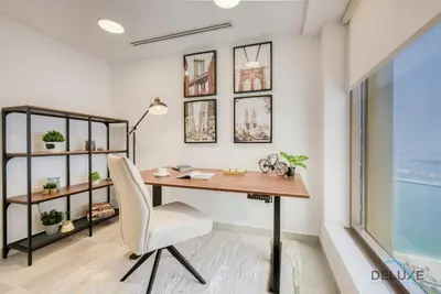 an office with a desk and a chair at Outstanding 3BR at Sadaf 7 JBR by Deluxe Holiday Homes in Dubai